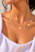 Gold disc necklace by Izabell by Aleena