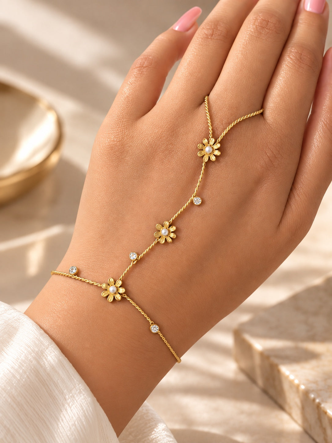 Gold floral pearl hand chain